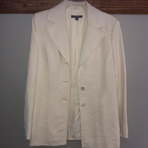 Cream colored long suit jacket